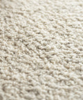 white boucle runner by Mark Krebs