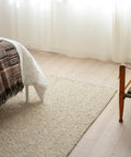 white boucle area rug by Mark Krebs 