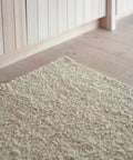 white boucle runner by Mark Krebs