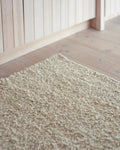 white boucle runner by Mark Krebs