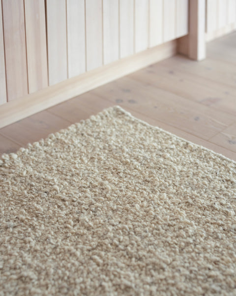 white boucle runner by Mark Krebs