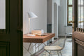 white yuh lamp by louis poulsen on a scandinavian desk by louis poulsen