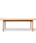 oak light oiled post dining table designed by Cecilie Manz for fredericia furniture