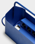 Pedestal Cable Villa in Ultra Marine, steel cable box on wheels, close up with a power bar inside, sold separately