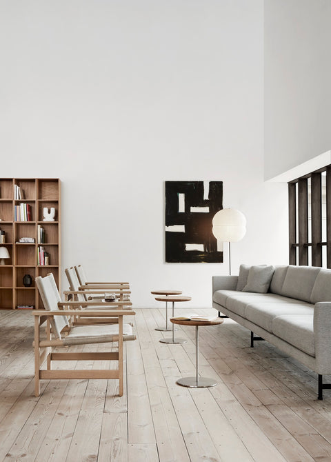 Grey Fredericia Calmo 3 Seater sofa styled with Mogensen Canvas Chairs and Pal side tables in a modern space