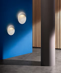 white texture flindt wall lamp designed by christian flindt for louis poulsen