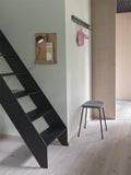 Muuto Coil Coat Rack in modern entryway with minimalist design 