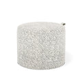 Gus Modern Drummond Pouf in Jubilee Dalmatian fabric with black speckled texture and integrated handle"