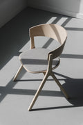 EDITS Circus Chair with upholstered grey seat, modern Canadian dining chair in natural ash wood.