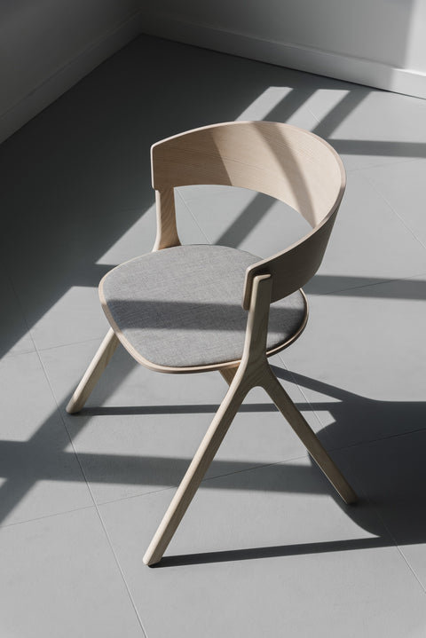 EDITS Circus Chair with upholstered grey seat, modern Canadian dining chair in natural ash wood.