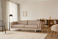 scandinavian mid century modern inspired living room with sofa and shelving 