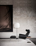 ox chair in black leather with ottoman designed by Hans j Wegner for fredericia furniture