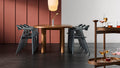 Blu Dot Dibs Chairs in midnight stained beech wood, shown stacked around a round walnut dining table demonstrating the chair's stackable design, styled with a walnut bar cart and pendant light