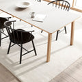 ana dining table with white laminate top and oak legs by fredericia furniture