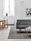 Side view of Fredericia No. 1 Sofa with tufted cushions