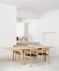 post dining table and post dining chairs designed by cecile manz for fredericia furniture