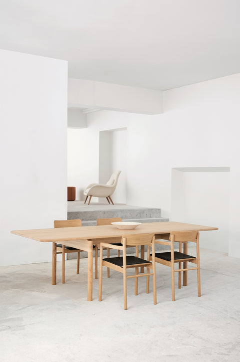 post dining table and post dining chairs designed by cecile manz for fredericia furniture