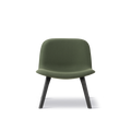 Front view of Fredericia Eyes Lounge Chair green upholstered seat on black oak legs Scandinavian design