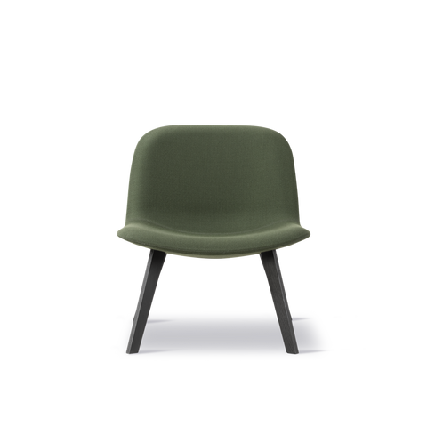 Front view of Fredericia Eyes Lounge Chair green upholstered seat on black oak legs Scandinavian design