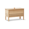 Form & Refine A Line Storage Bench 68, White Oak, oak storage bench with lid, three-quarter view on white background