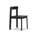 Form & Refine Blueprint Chair, Black, solid oak dining chair, three-quarter view on white background