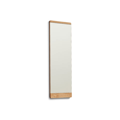 Form & Refine Rim Mirror 35x105, Oak, tall oak-framed wall mirror, three-quarter view on white background