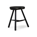 Form & Refine Shoemaker Chair™, No. 49, Black Stained Beech, wooden Shoemaker stool, three-quarter view on white background