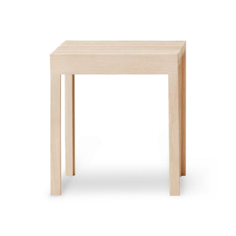 Form & Refine Lightweight Stool, White Oak, solid oak stool with a white oil finish, three-quarter view on white background