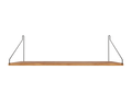 Frama Single Shelf, Natural Oak in Black, long deep oak board on two black wire brackets, seen straight on against grey