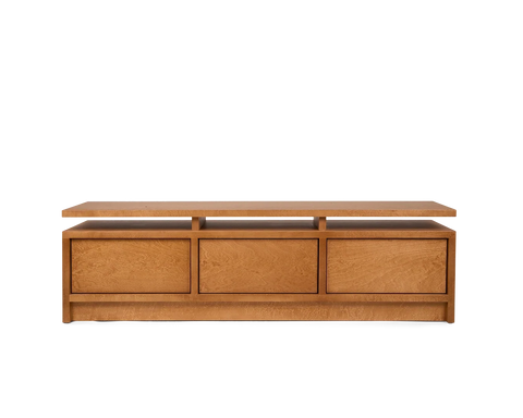 Frama Ratio Console in Warm Brown Birch, low birch console with three closed drawers under a floating top panel, front view on white