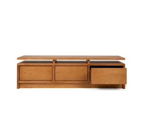 Frama Ratio Console in Warm Brown Birch, birch console with the right hand drawer pulled open and two drawers closed beside it, on white