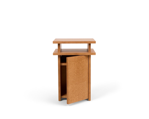 Frama Ratio Side Table in Warm Brown Birch, birch cabinet with the door swung wide open toward the camera, empty inside, shown on white