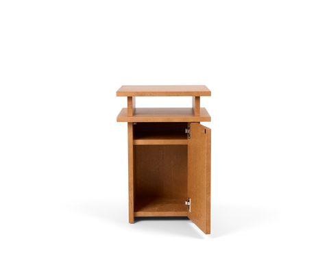 Frama Ratio Side Table in Warm Brown Birch, three quarter view with the door open at the side showing the plain birch interior