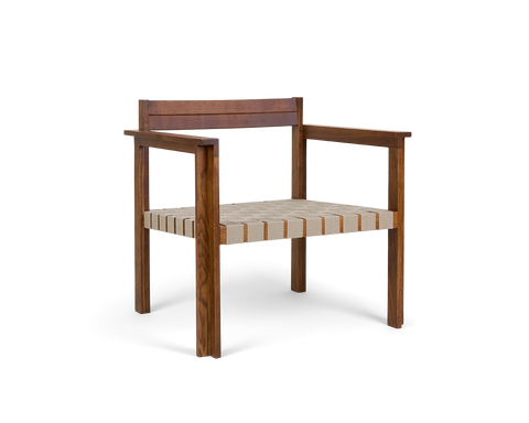 Frama Symmetry Easy Chair in Oat Fabric and Honey Ash, ash armchair turned slightly to show the arm rails and the woven seat straps