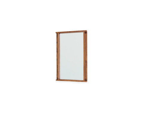 Frama Symmetry Mirror, small rectangular mirror in a brown wood frame hanging on a white wall, seen slightly from the side