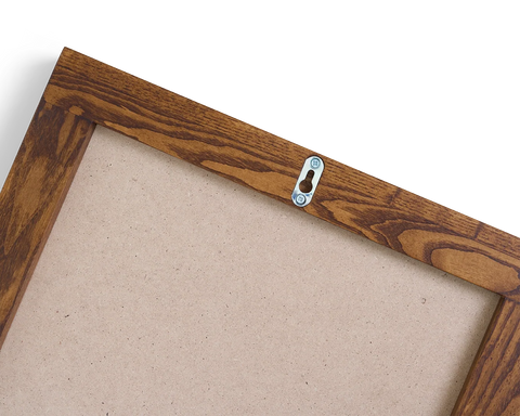 Frama Symmetry Mirror, back of the mirror showing the board backing panel and a small metal keyhole hanger on the top rail