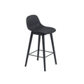 muuto fiber counter stool with wood base in anthracite black and black