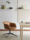 scandinavian workstation with oak desk and leather chair