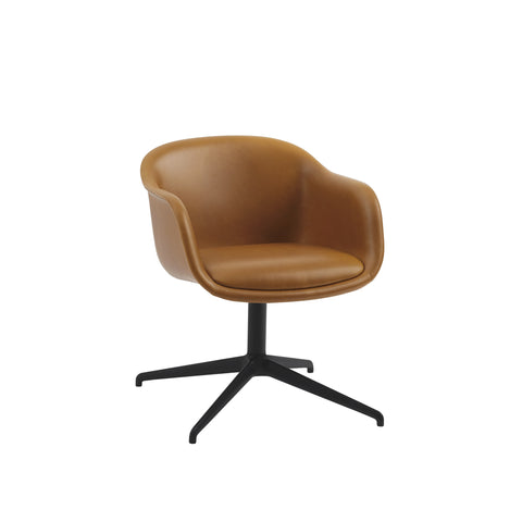 fiber conference armchair with swivel base in refine leather cognac and anthracite black base