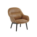 muuto fiber lounge armchair with wood base in refine leather cognac and black base 