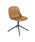 fiber side swivel chair with refine cognac leather by muuto