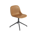 fiber side swivel chair with refine cognac leather by muuto