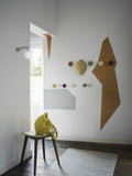 Muuto Dots wood wall hooks in home office, ideal for organizing and enhancing modern Scandinavian workspace.