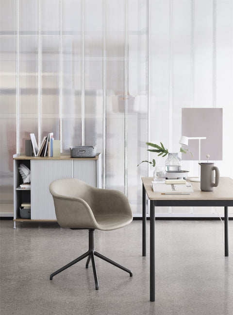 scandinavian leather swivel armchair by muuto lifestyle image 