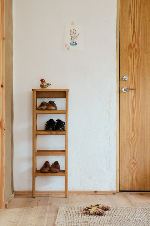 Form & Refine A Line Shoe Rack 35, narrow oak shoe rack, narrow oak shoe rack holding shoes beside a front door with a wooden frame