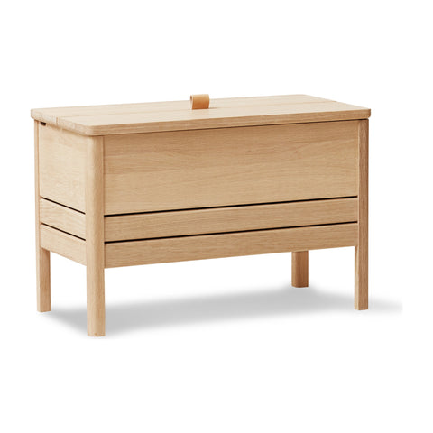 Form & Refine A Line Storage Bench 68, White Oak, oak storage bench with lid, three-quarter view on white background