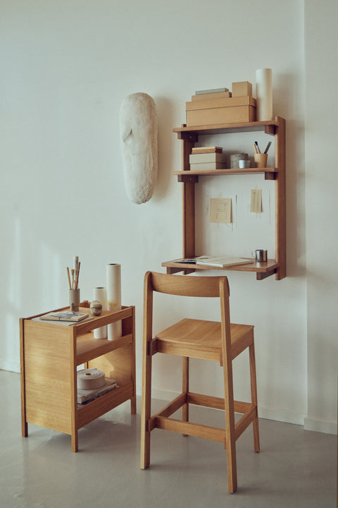 Form & Refine Journal Organiser, solid oak organiser table, oak bar chair at the Journal Organiser used as a standing desk beneath a wall shelf