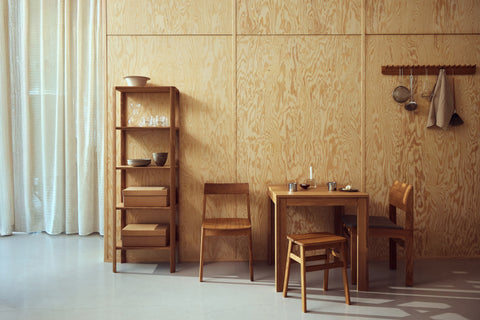 Form & Refine Leaf Shelf 0.5x5, tall oak shelving unit, tall oak shelf in a kitchen beside a square table with Blueprint and Sonder chairs