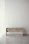 Form & Refine Remake Bench, recycled carton bench, the recycled-carton bench against a white wall, front view