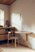 Form & Refine Trefoil Folding Wall Table, oak folding wall table, oak folding wall table set for one with a Lunar chair in a kitchen corner